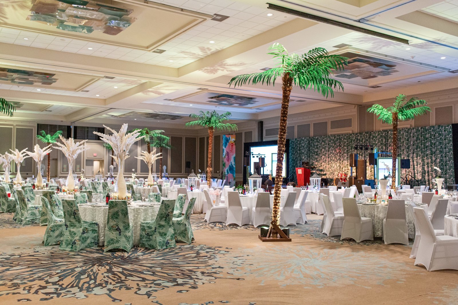 inside of a ballroom decorated for a gala