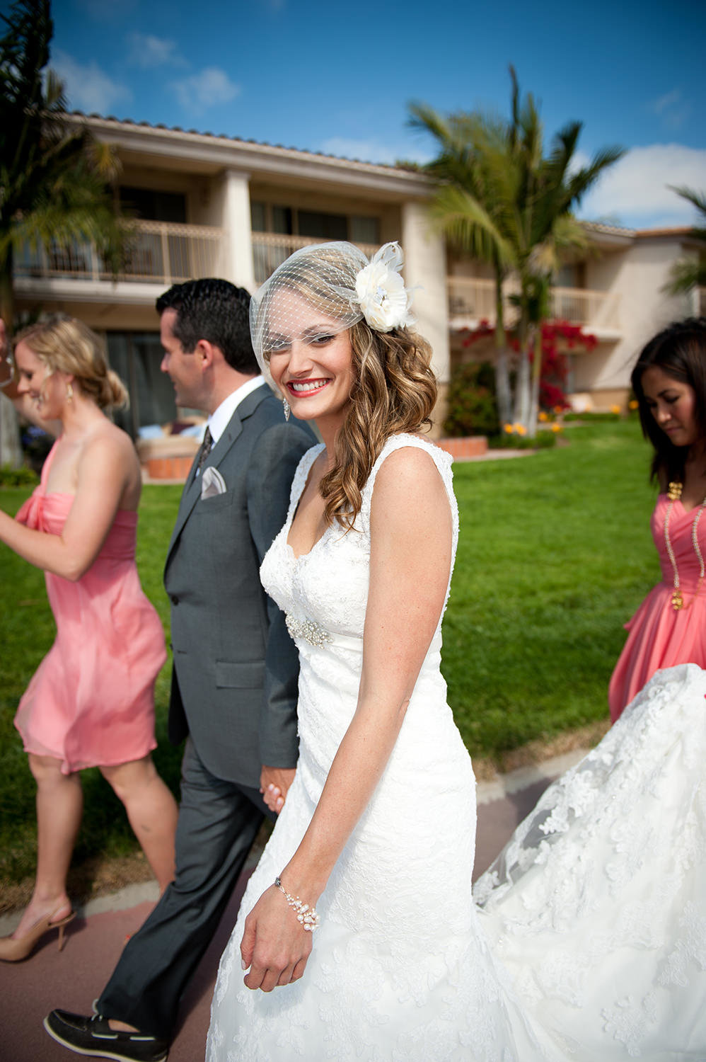 Bride walking with bridal party at hilton mission bay