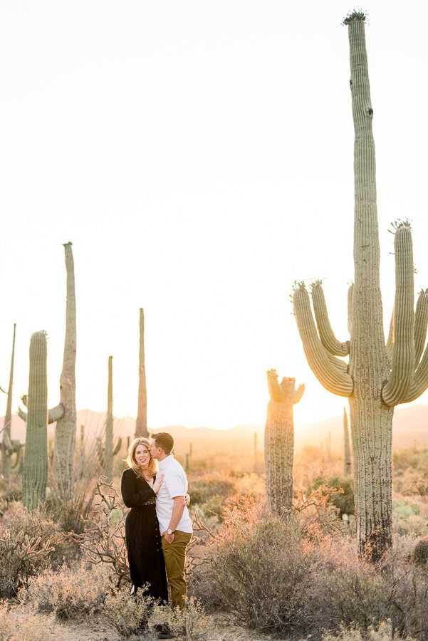 Gates Pass Tucson Desert Engagement Session Photo of Saguaro Cactus and Couple in Black Dress and White Shirt and Khaki Pants | Tucson Wedding Photographer | West End Photography