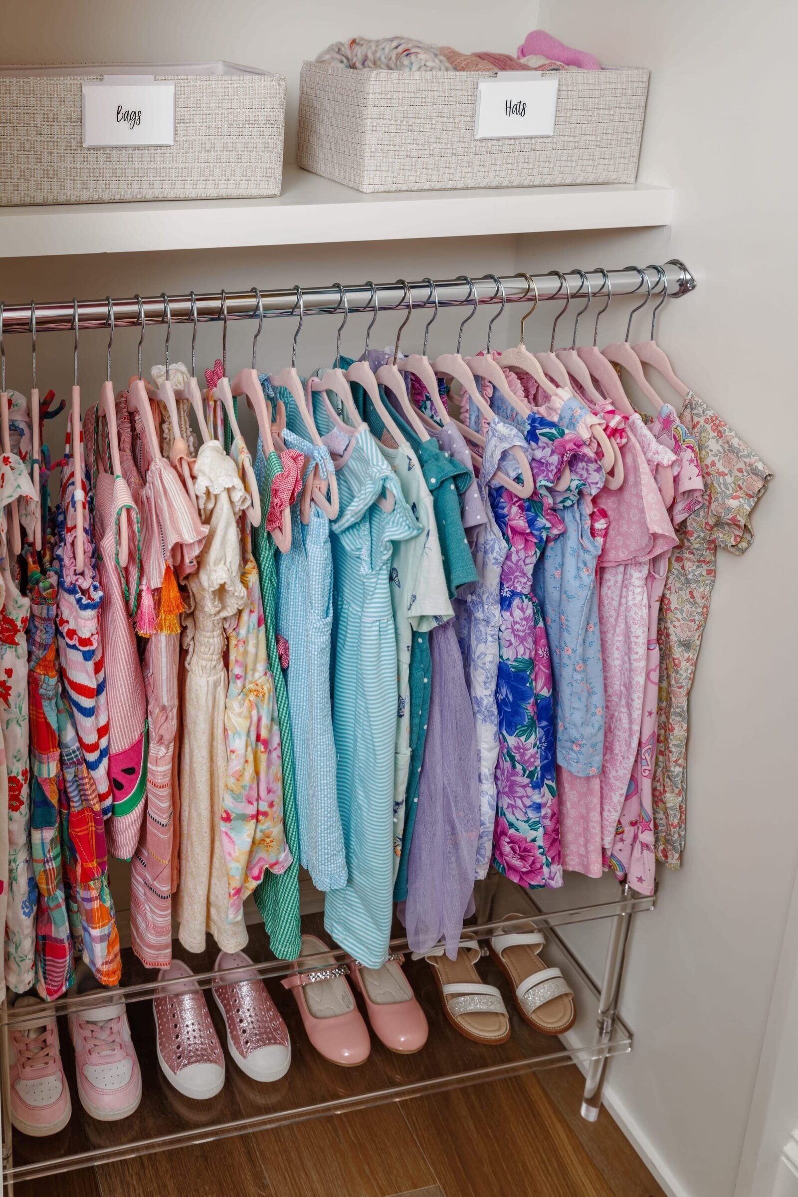 vision and hammer organizing girls closet with shoe rack and dresses