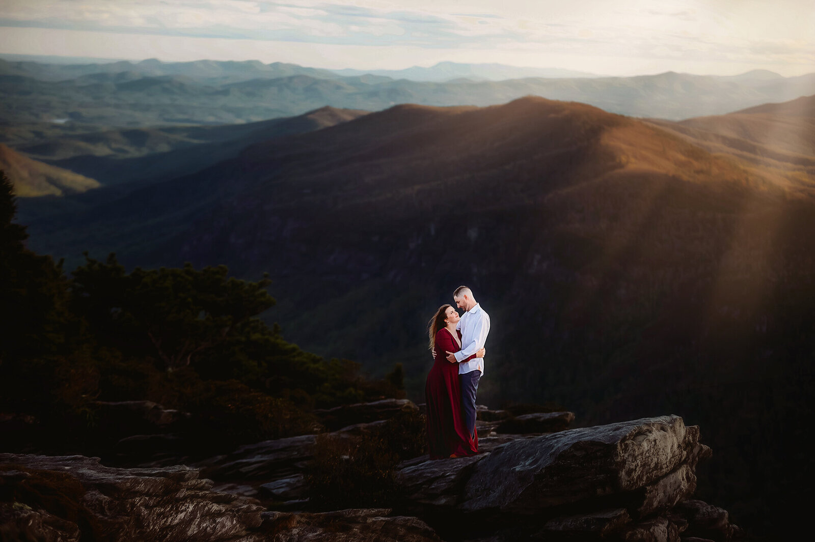 A couple poses for Engagement Photos in the Linville Gorge near Asheville, NC.