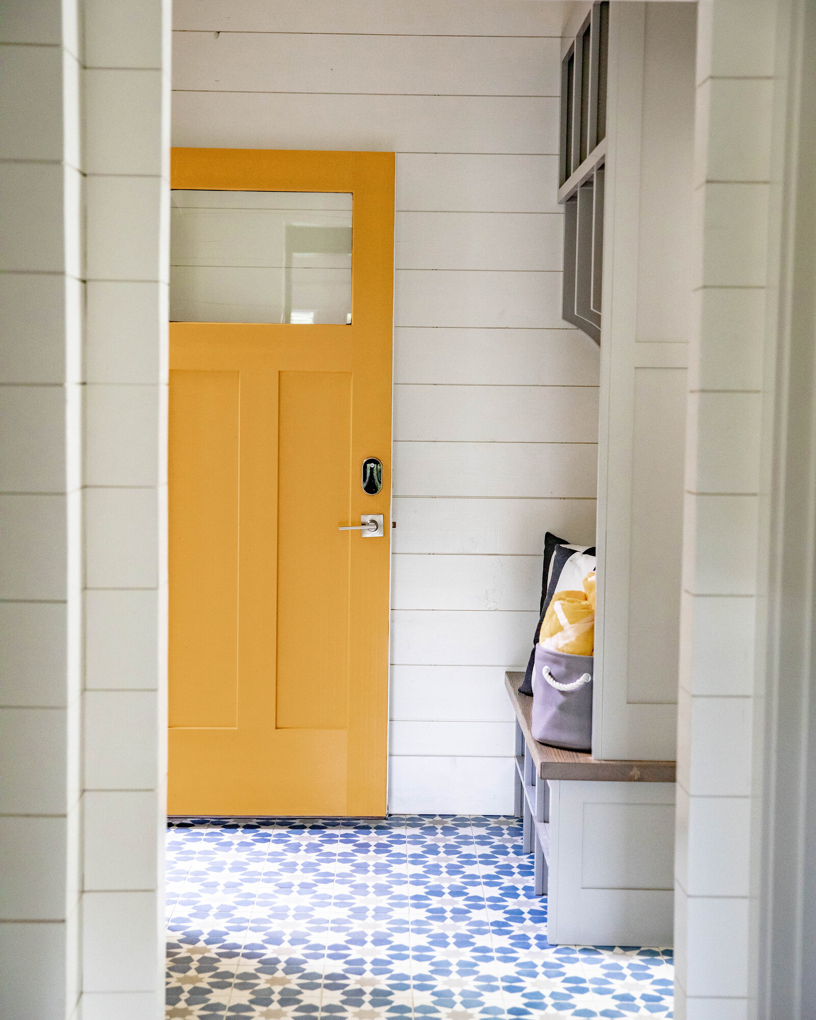 la_bella_vie_yellow_front_door_tile_floor_blue_and_white_lakehouse