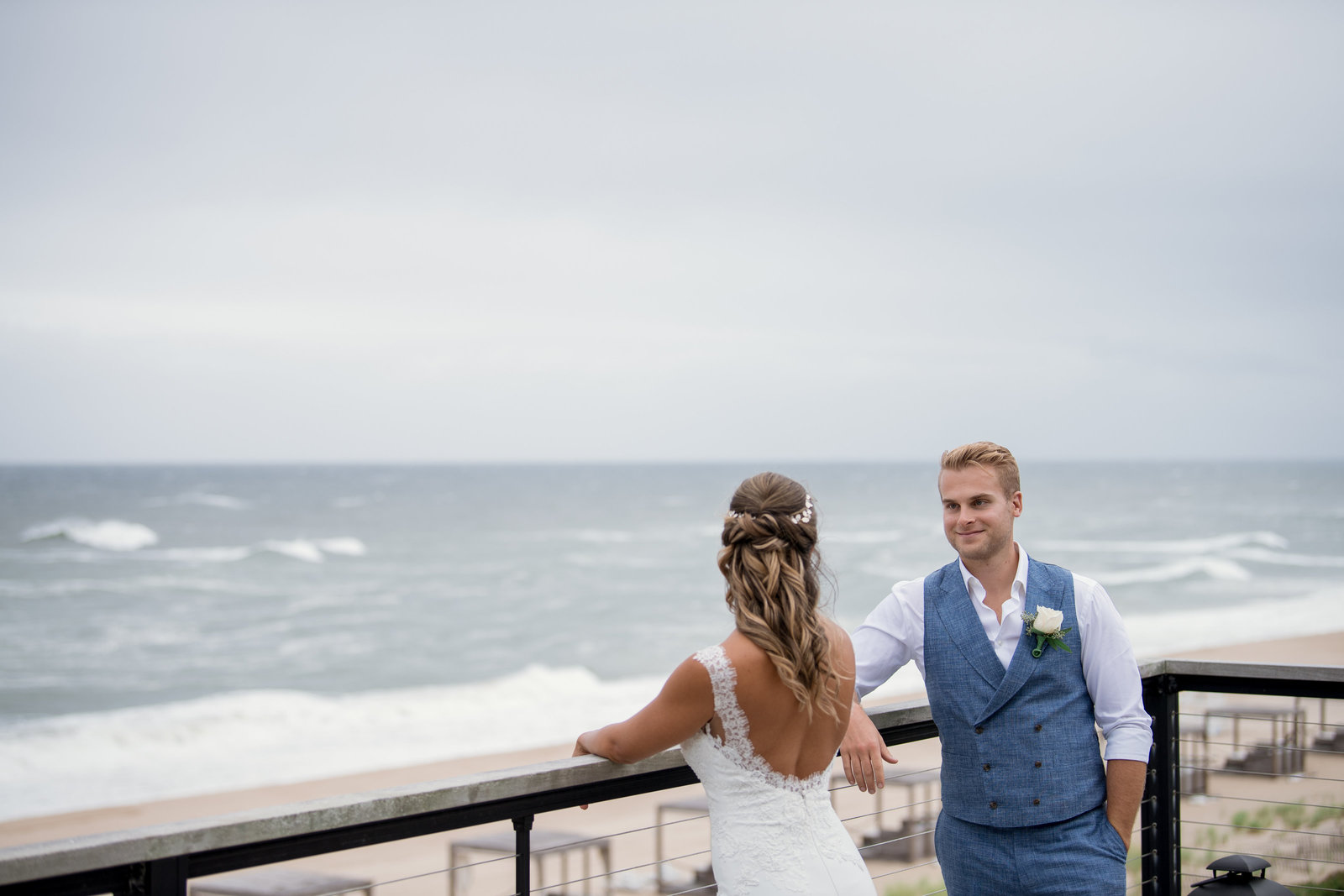 photo of groom looking at his bride from Gurneys Montauk Resort wedding