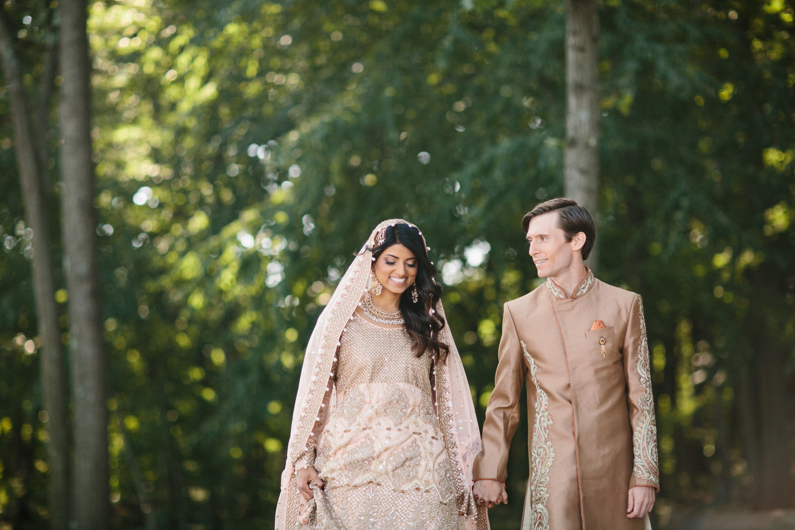 Bride and groom photographed together during the Indian part of their Indian -American wedding celebration.