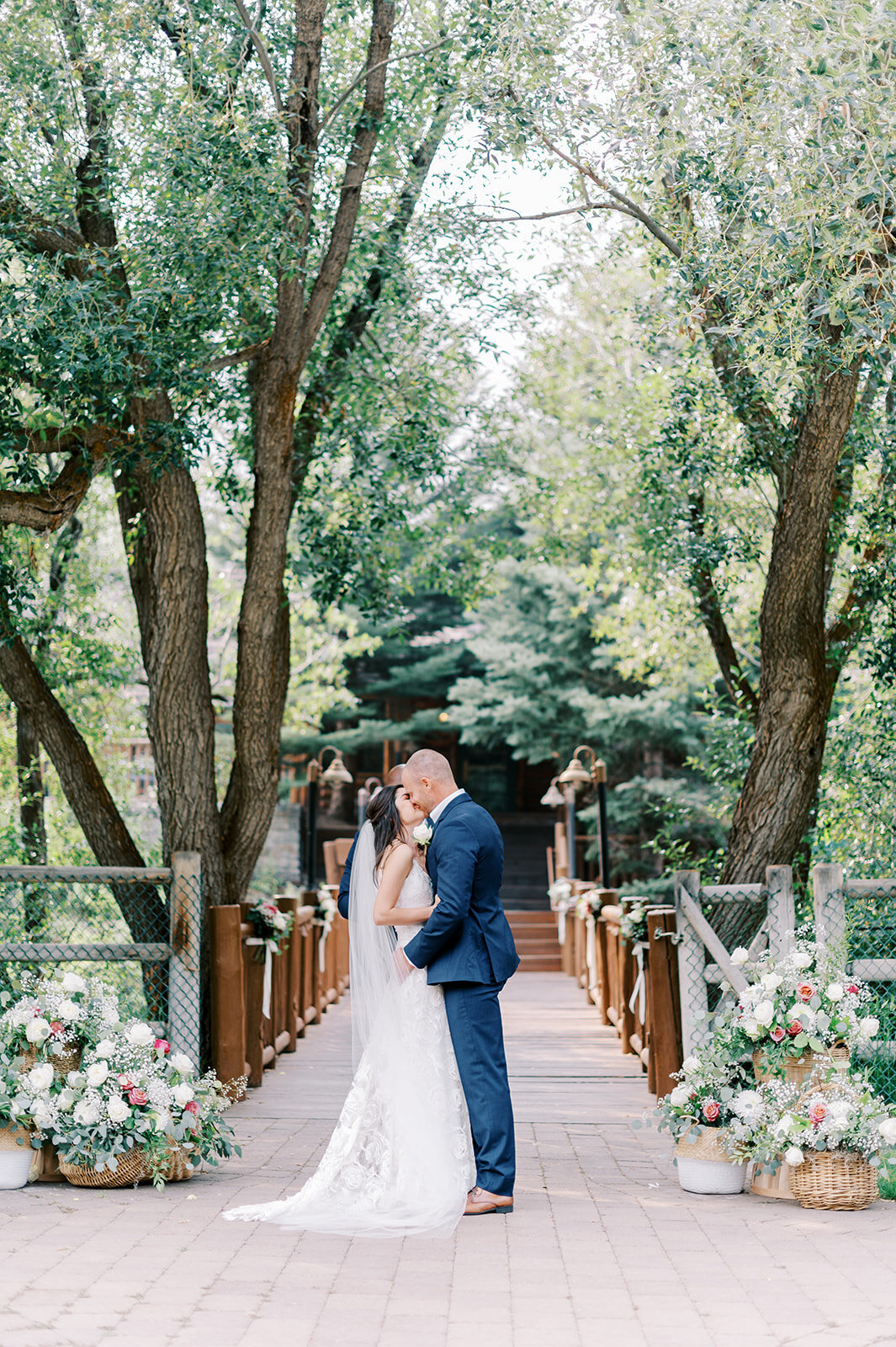 Ceremony kiss at Trail Creek Cabin Wedding taken by the Best Sun Valley Wedding Photographers