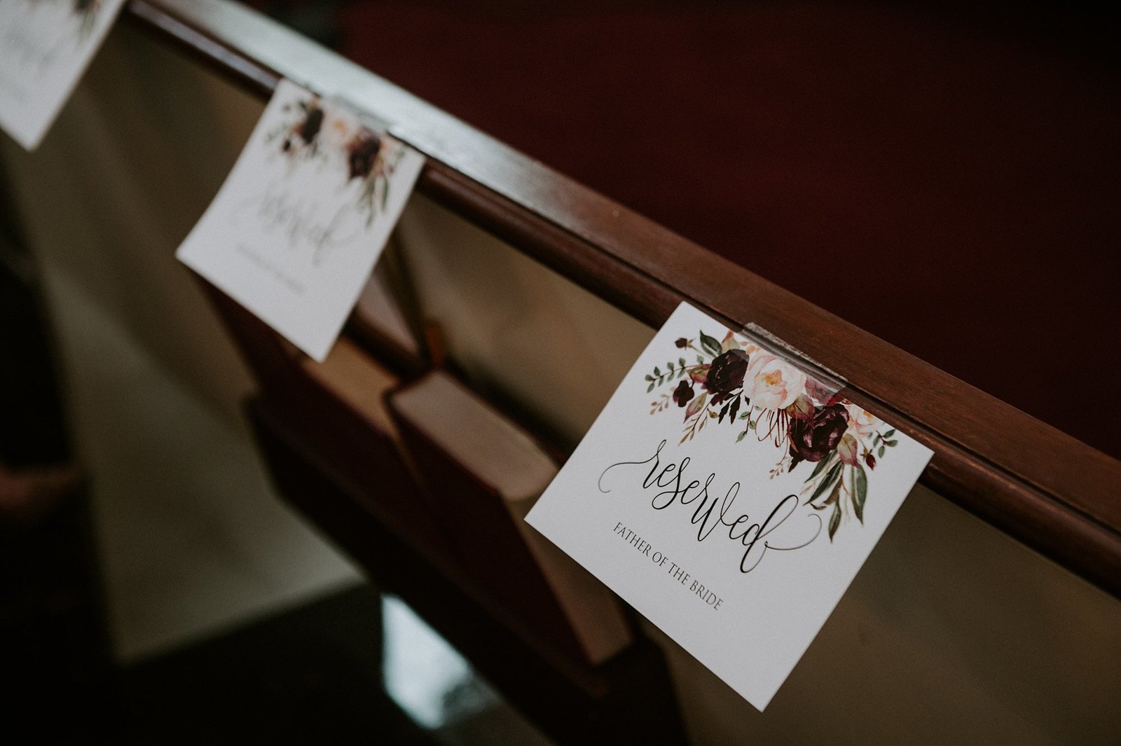 Church pew reserved wedding signs in rustic design