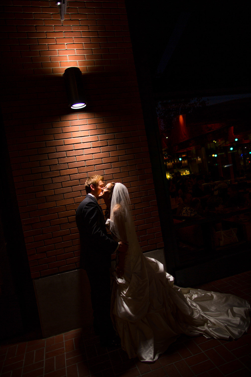 dramatic night shot with bride and groom