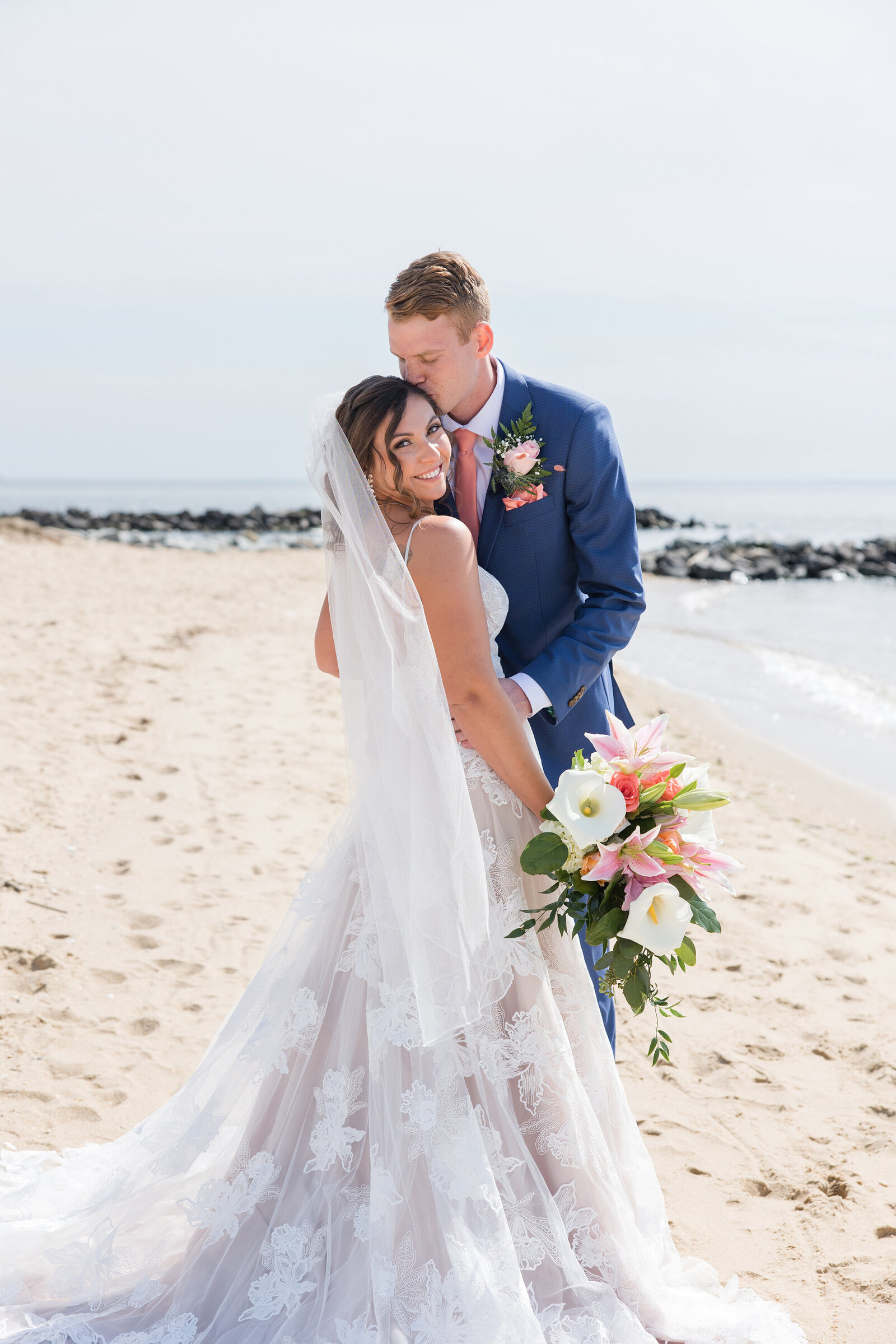 Silver Swan Bayside wedding photo of couple on beach in Stevensville, Maryland by Annapolis photographer Christa Rae Photography