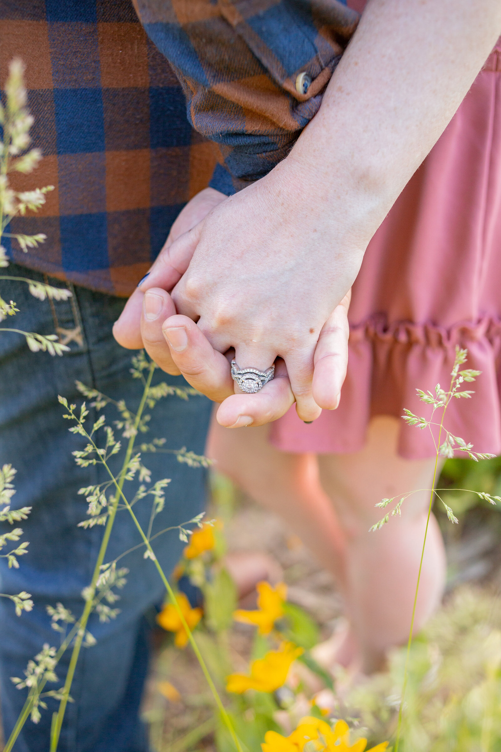 Washington Elopement Photographer captures close up of engagement ring during outdoor porrtaits