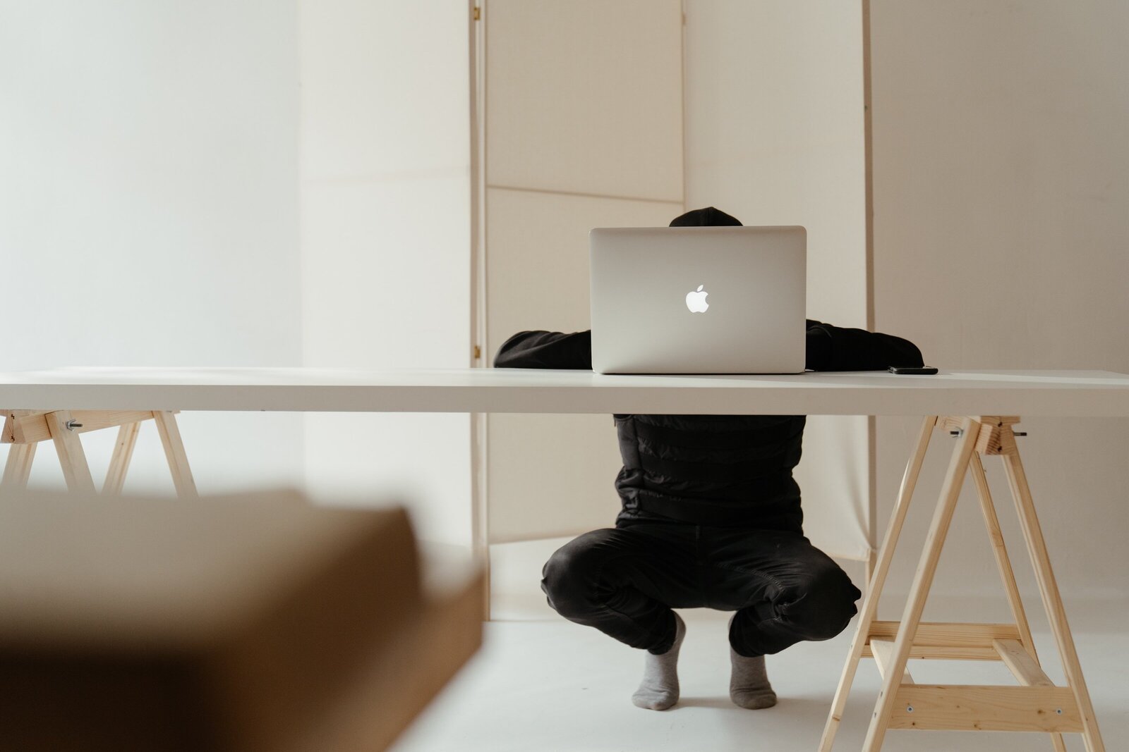 silver-macbook-on-white-table-4268520