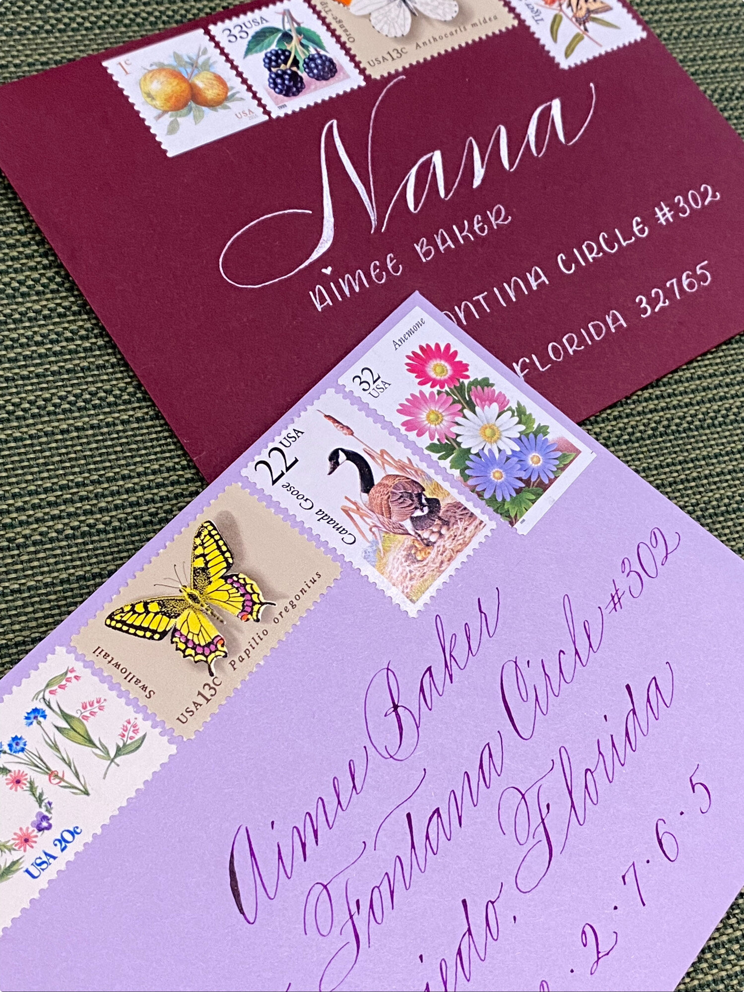 Elegant envelope with custom calligraphy with stamps