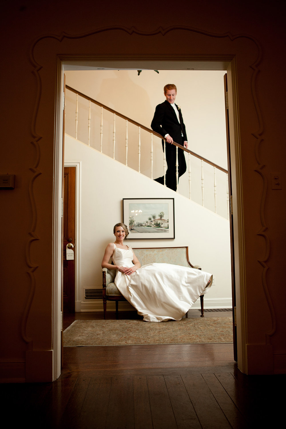 bride and groom on stairs at darlington house