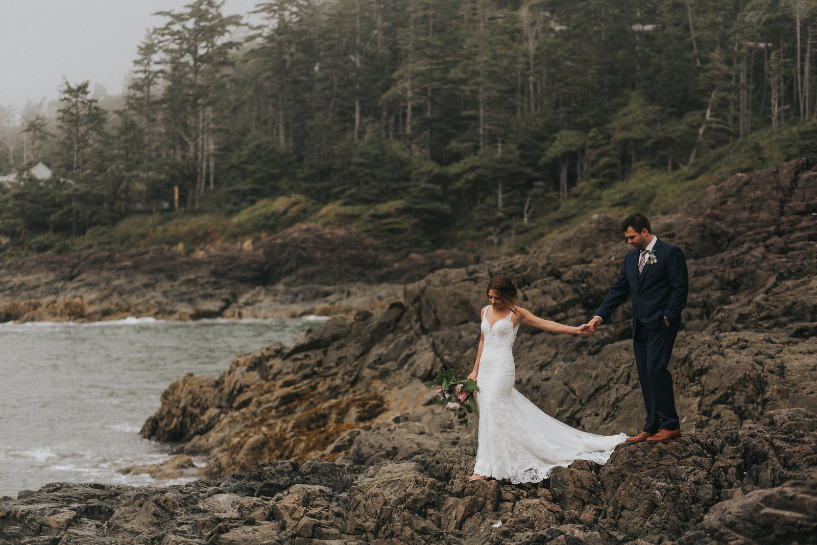 Adventurous bride and groom exploring Tofino beaches