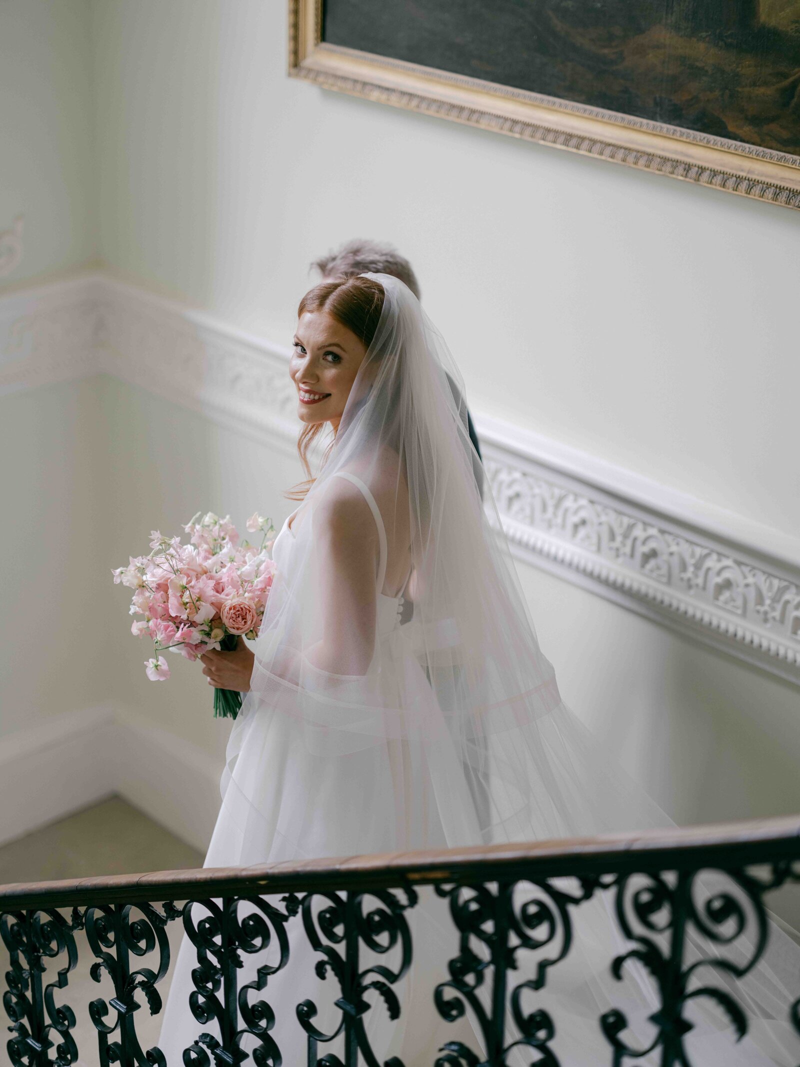 Bride on stairs of Came House Wedding venue