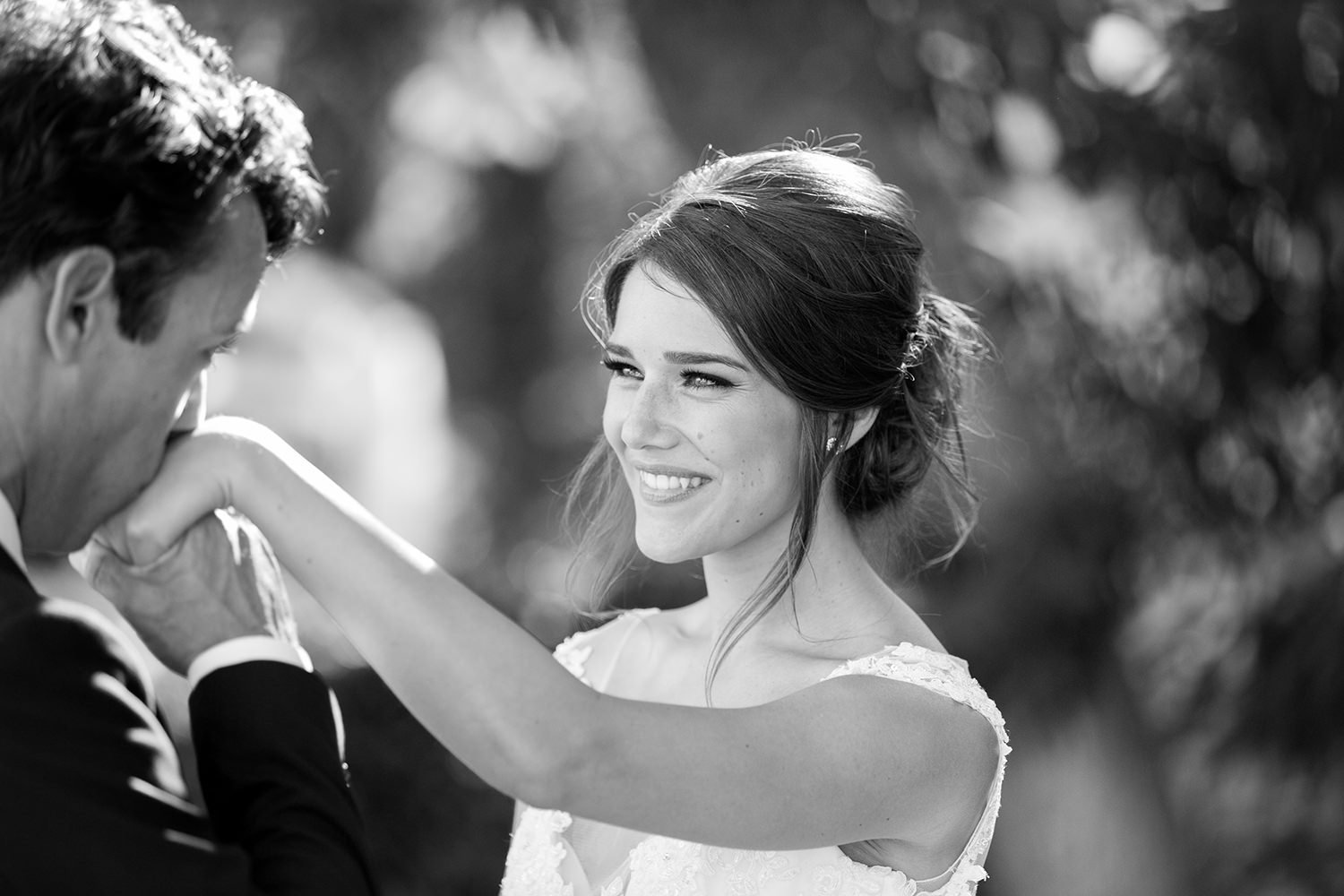 beautiful light with bride and groom at carlton oaks country club close up smiling
