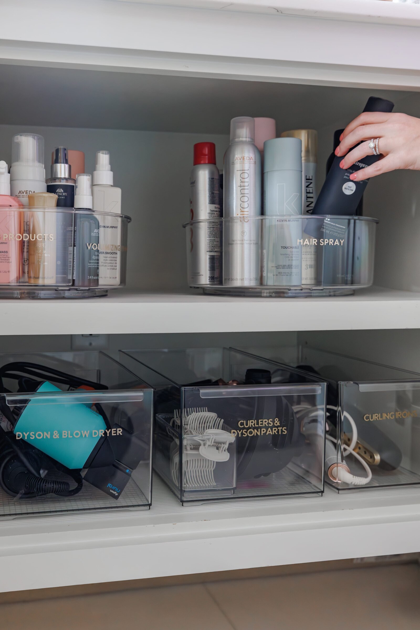 vision and hammer organizing bathroom cabinet with womens hair products