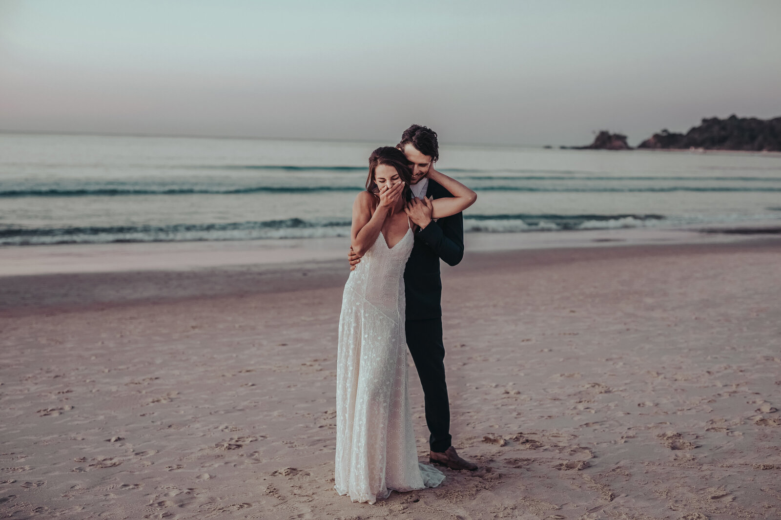 Romantic bride and groom photoshoot at seaside