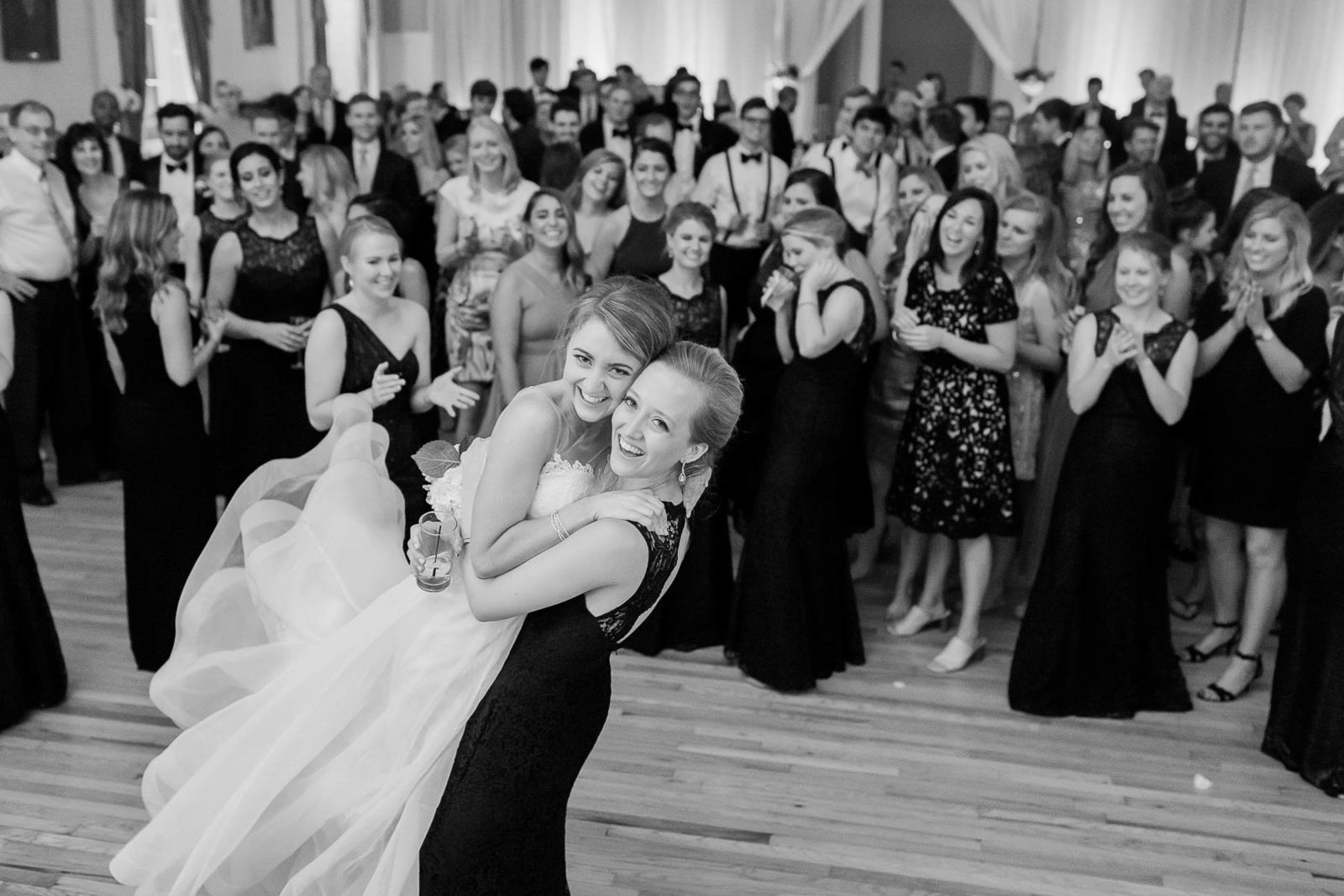 Bride throws bouquet, Hibernian Hall, Charleston, South Carolina