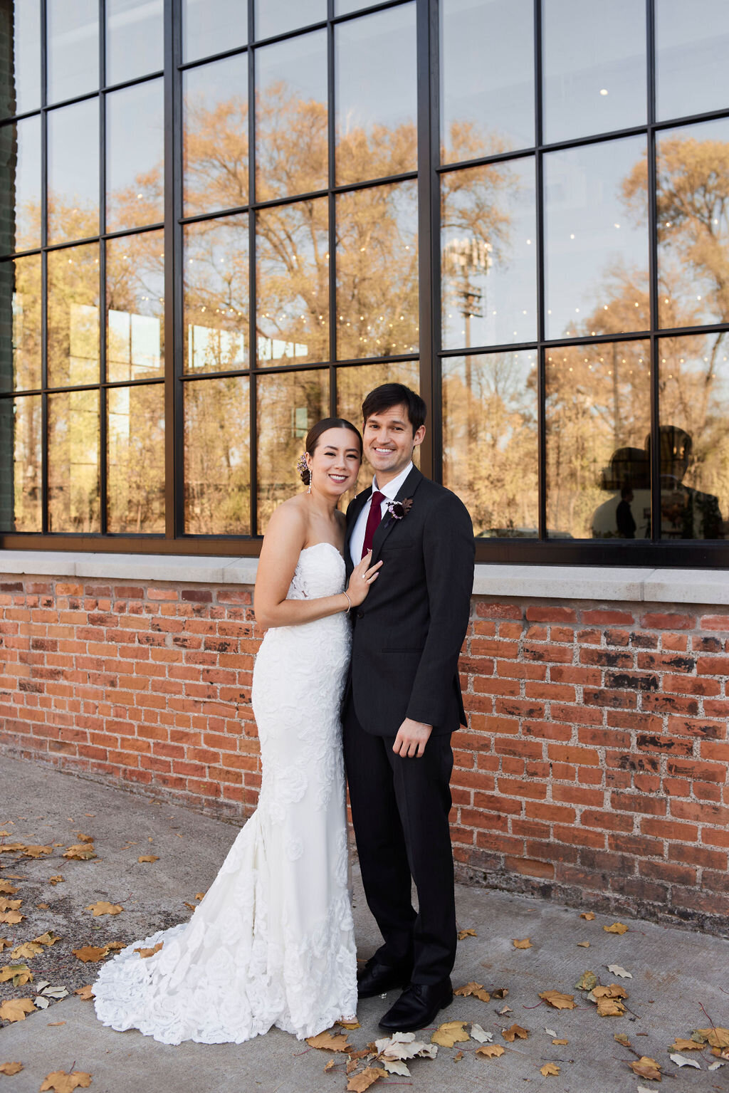 bride-groom-portrait-reflecting-glass-windows-october
