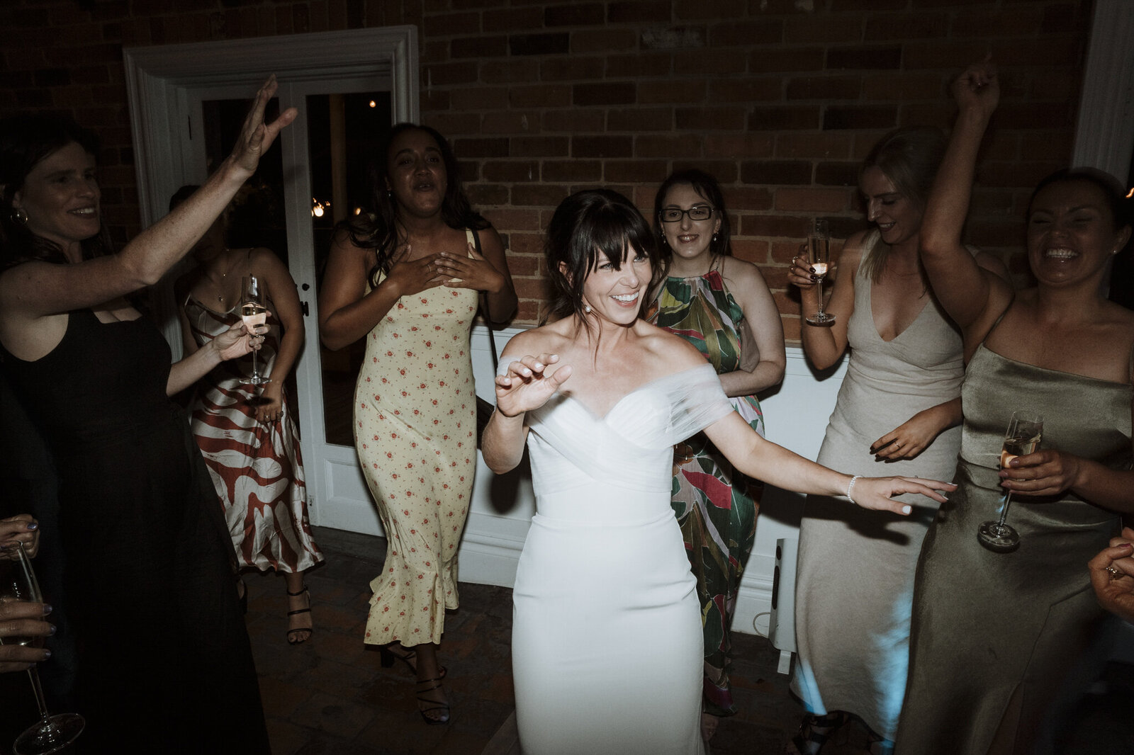 A bride dancing at her wedding at the farm yarra valley