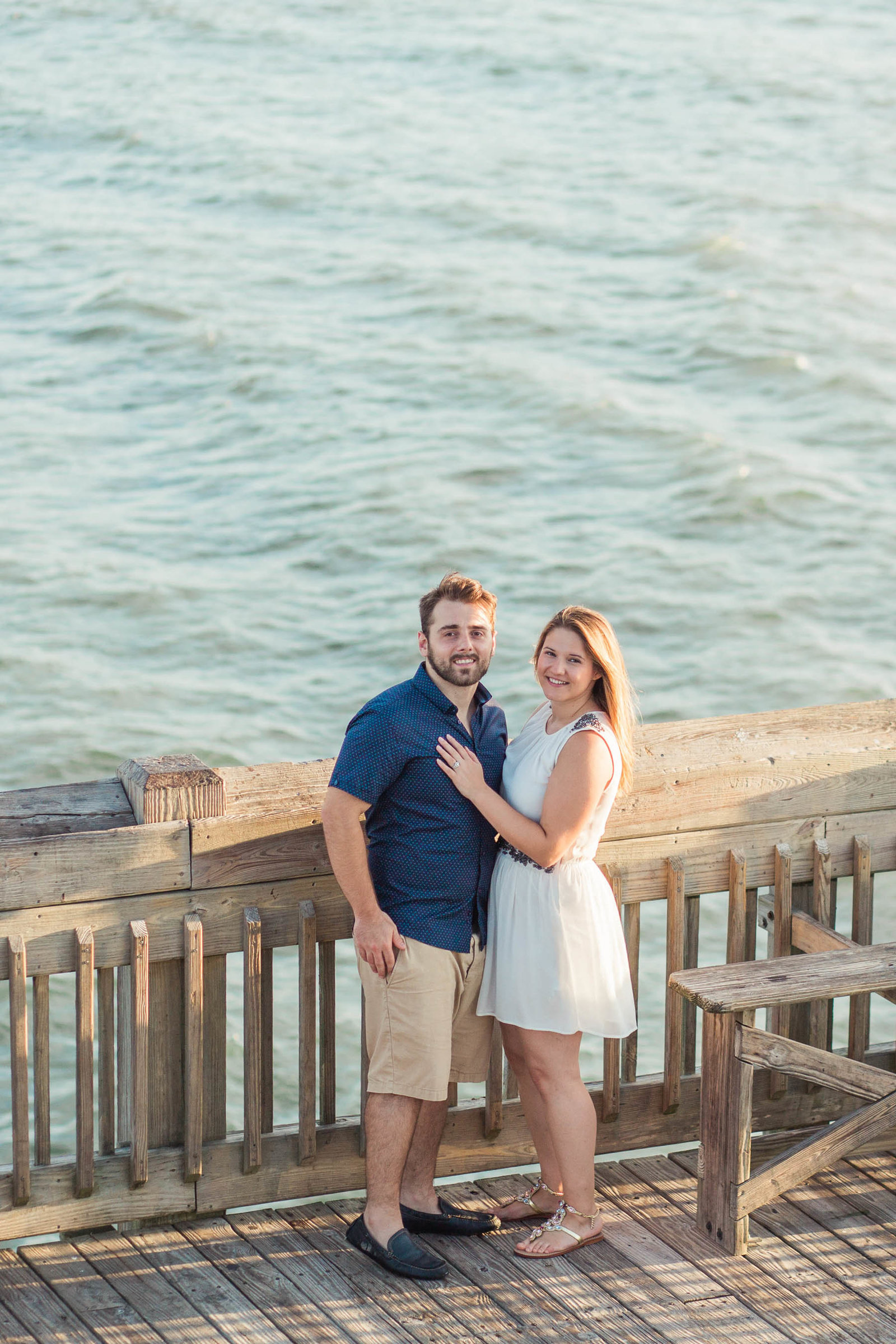 Engaged Couple on fishing pier, Folly beach in Charleston, South Carolina