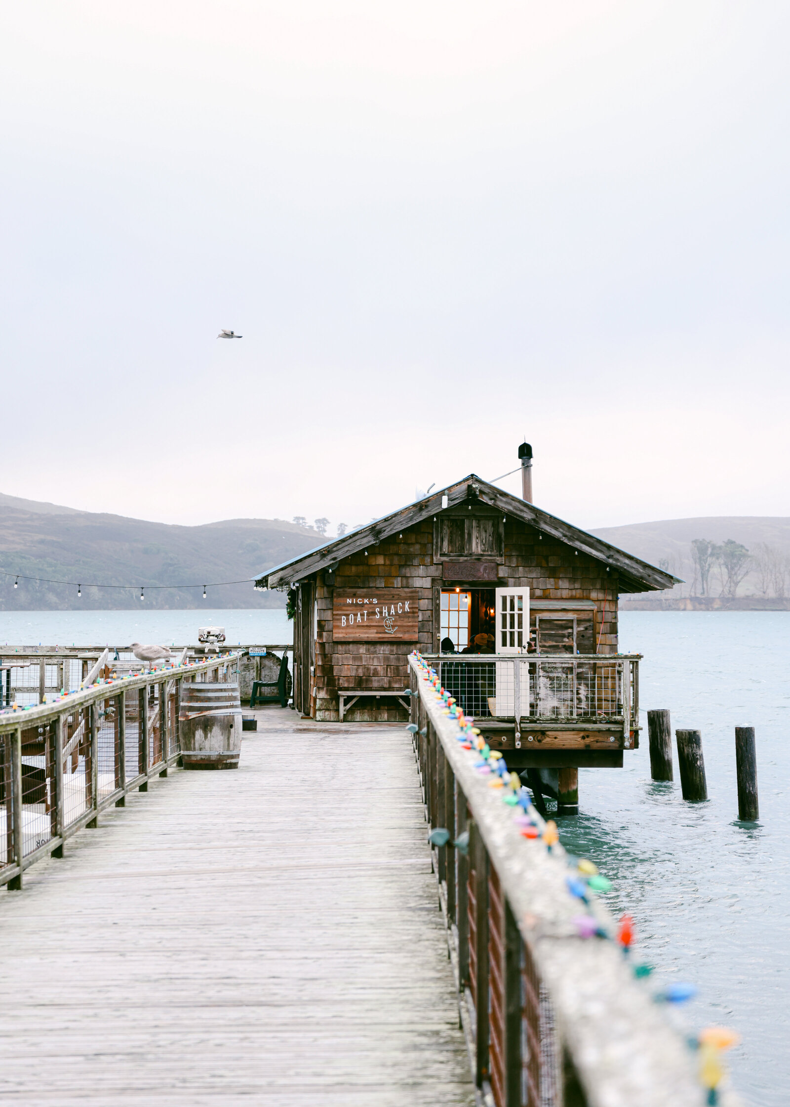 Travel tourism photographer Chelsea Loren California boat shack burned down at nick's cove