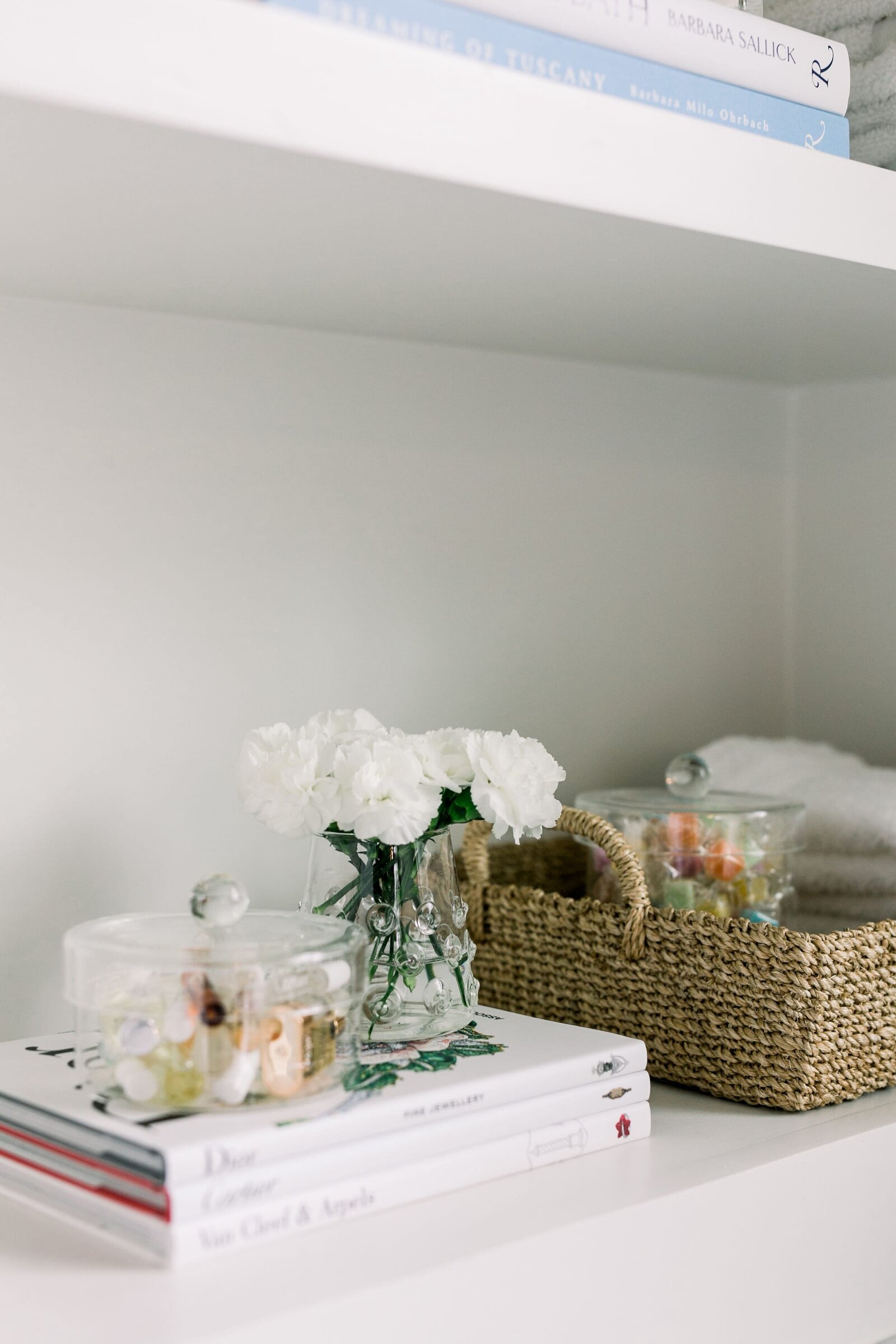 vision and hammer styling shelf on white cabinet in bathroon