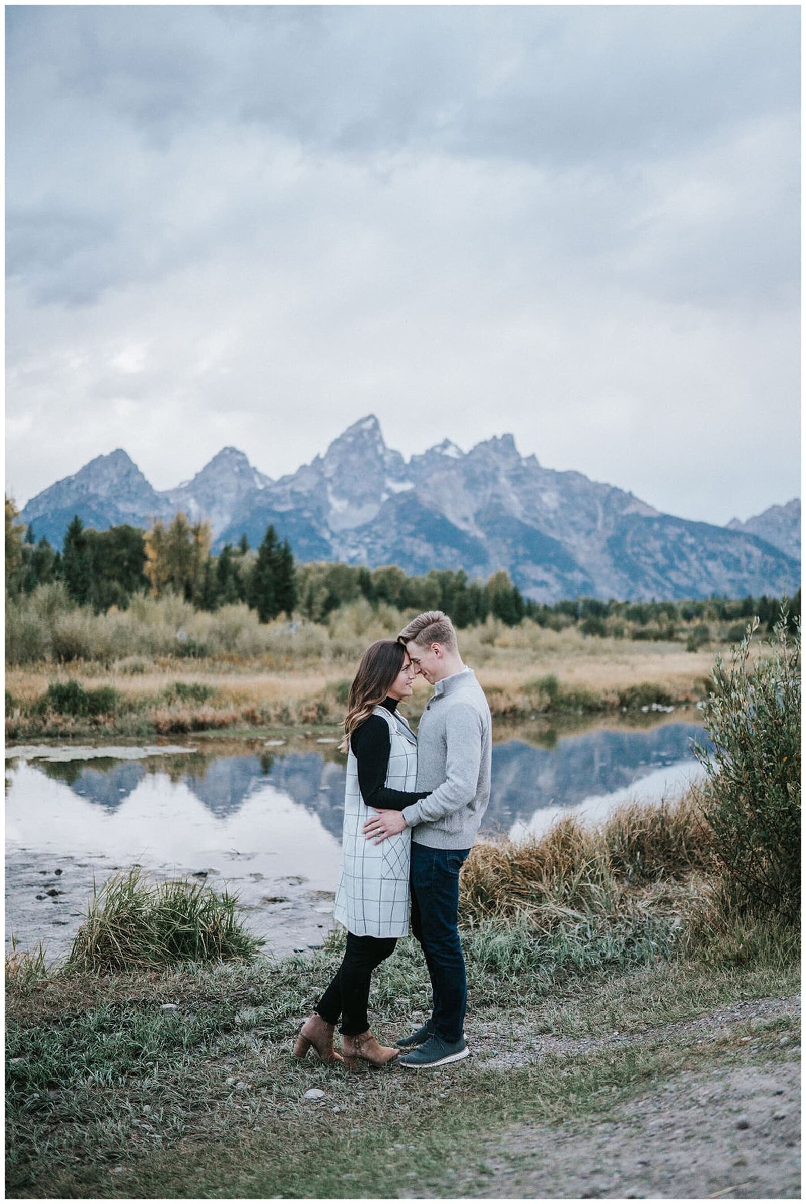 Lake Tahoe wedding photographer captures couple hugging during outdoor engagements
