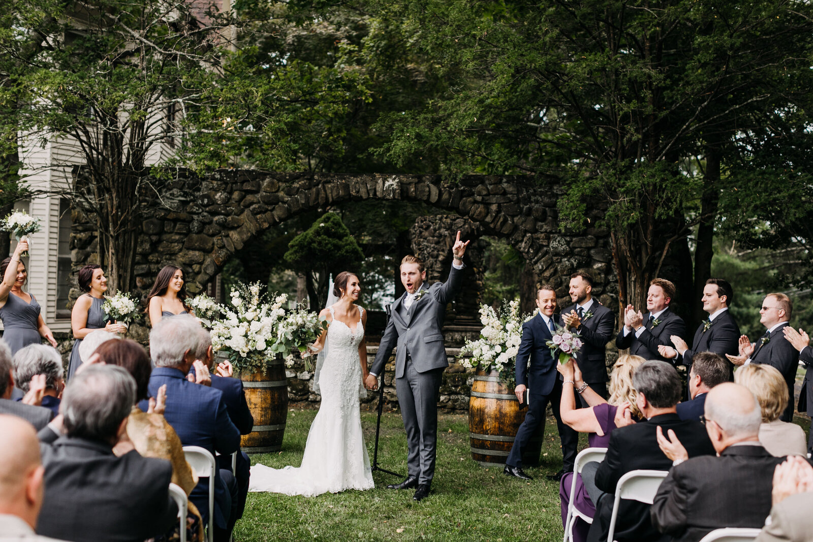 groom celebrating ceremony at winery