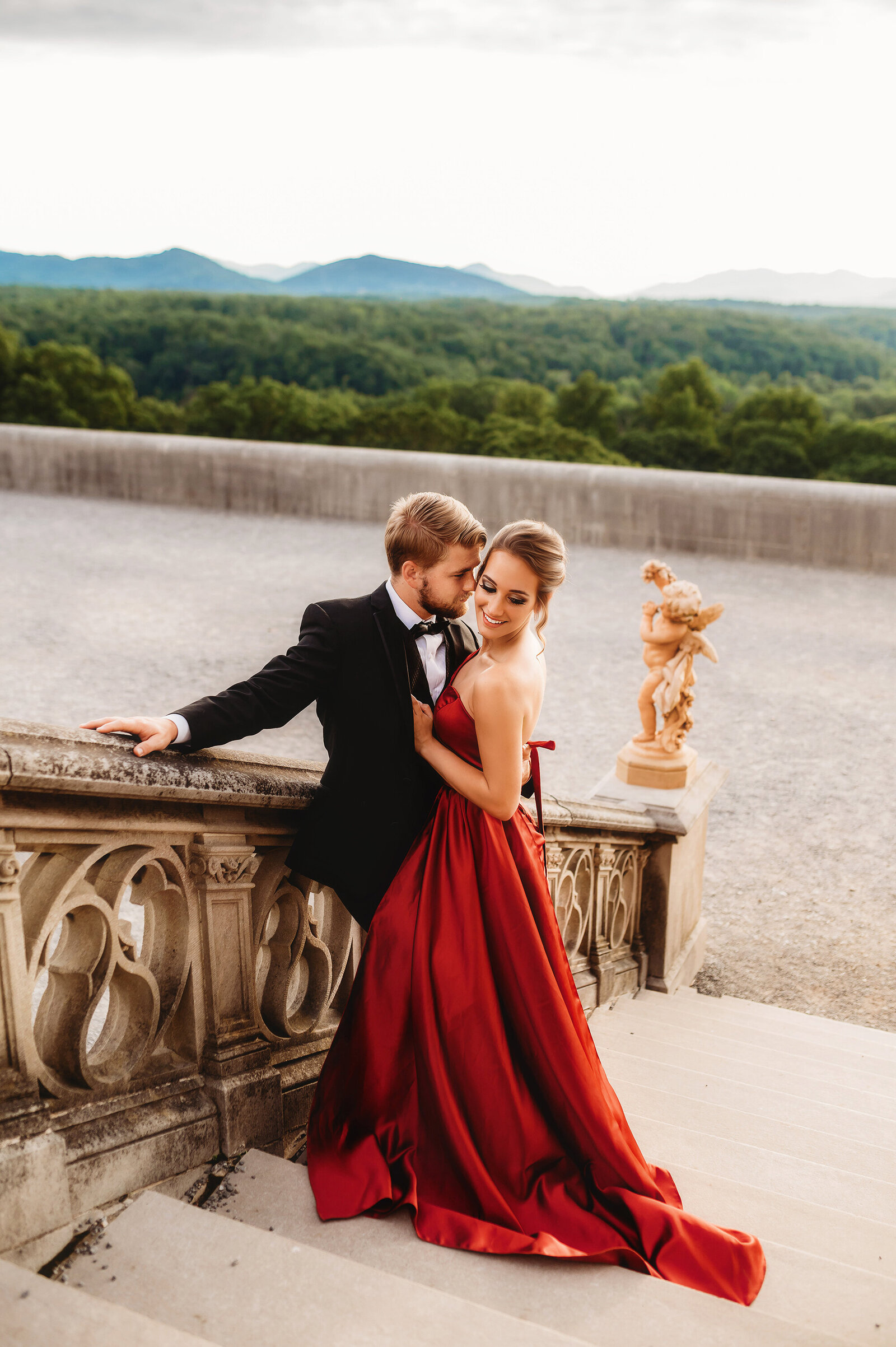 A couple poses for Engagement Photos at Biltmore Estate in Asheville, NC.