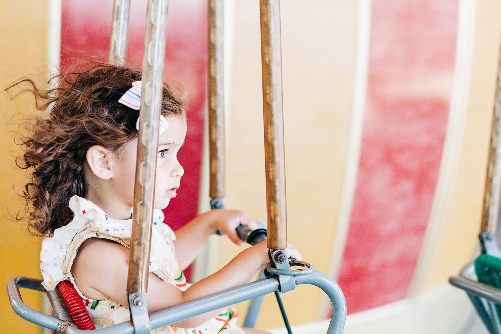 Portrait of a little girl at an amusement park