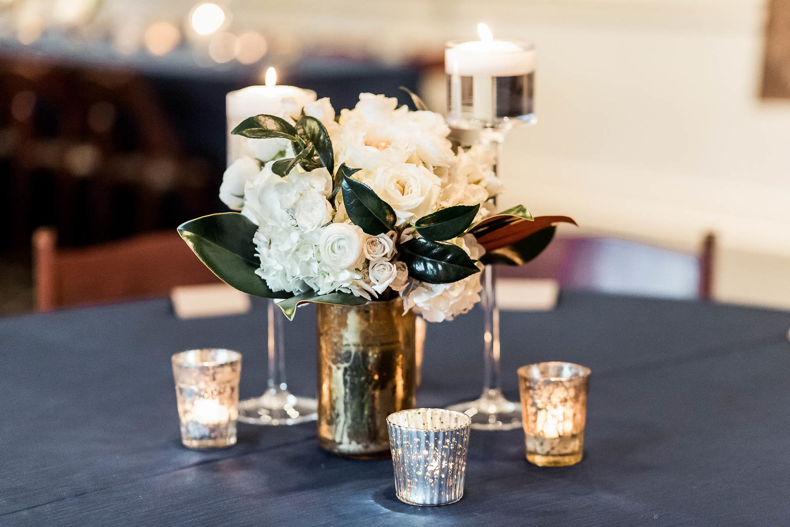 Beautiful floral centerpieces are on each table, Coleman Hall, Mt Pleasant, South Carolina