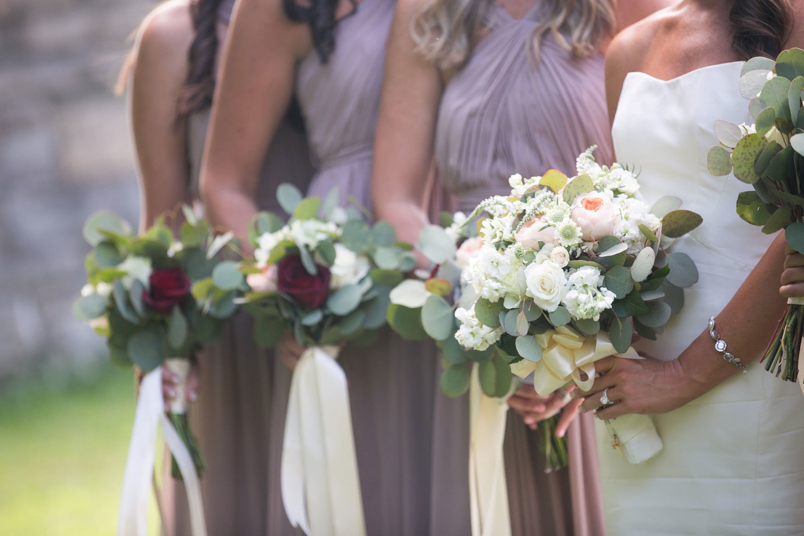 bride and bridesmaids with their bouquets at Glen Island Harbor Club