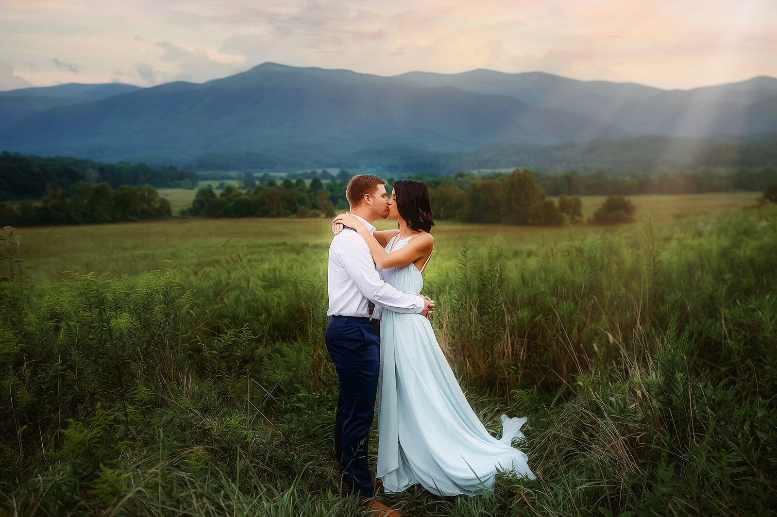 A couple poses for Engagement Photos in the Great Smokey Mountains National Park near Asheville, NC.