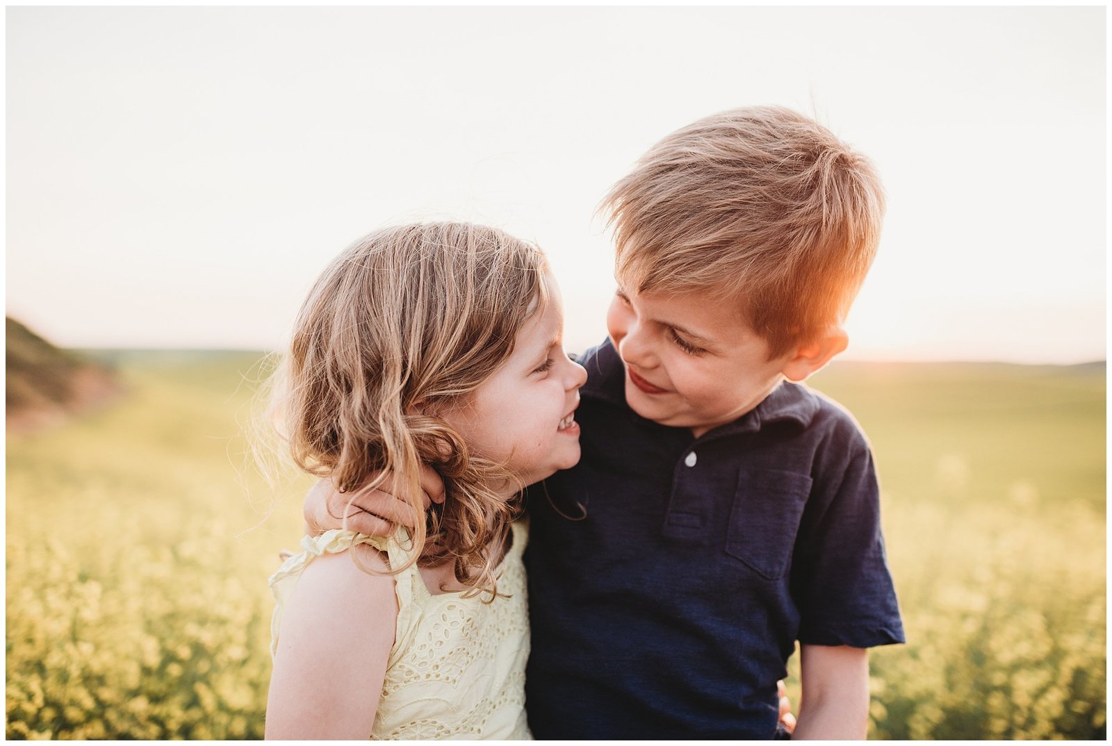 brother and sister giggling Emily Ann Photography Seattle Family Photographer