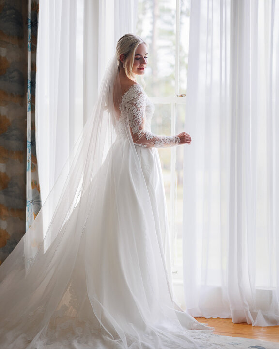 Candid bridal portrait with soft natural light at Chateau 1800