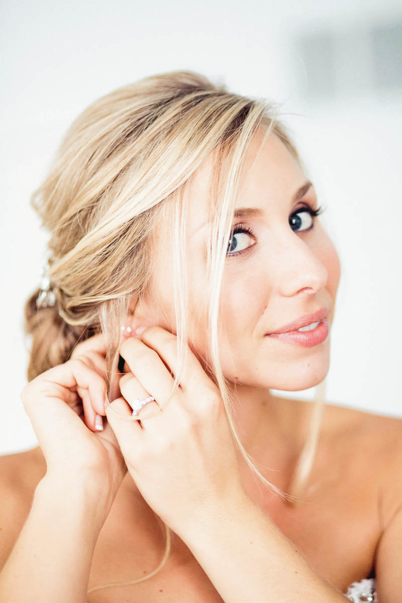 Bride gets jewelry on, Greenville Country Club, Delaware. Kate Timbers Photography.