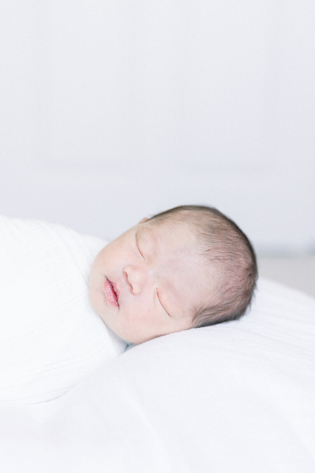Image of sleeping baby taken by Sacramento Newborn Photographer Kelsey Krall
