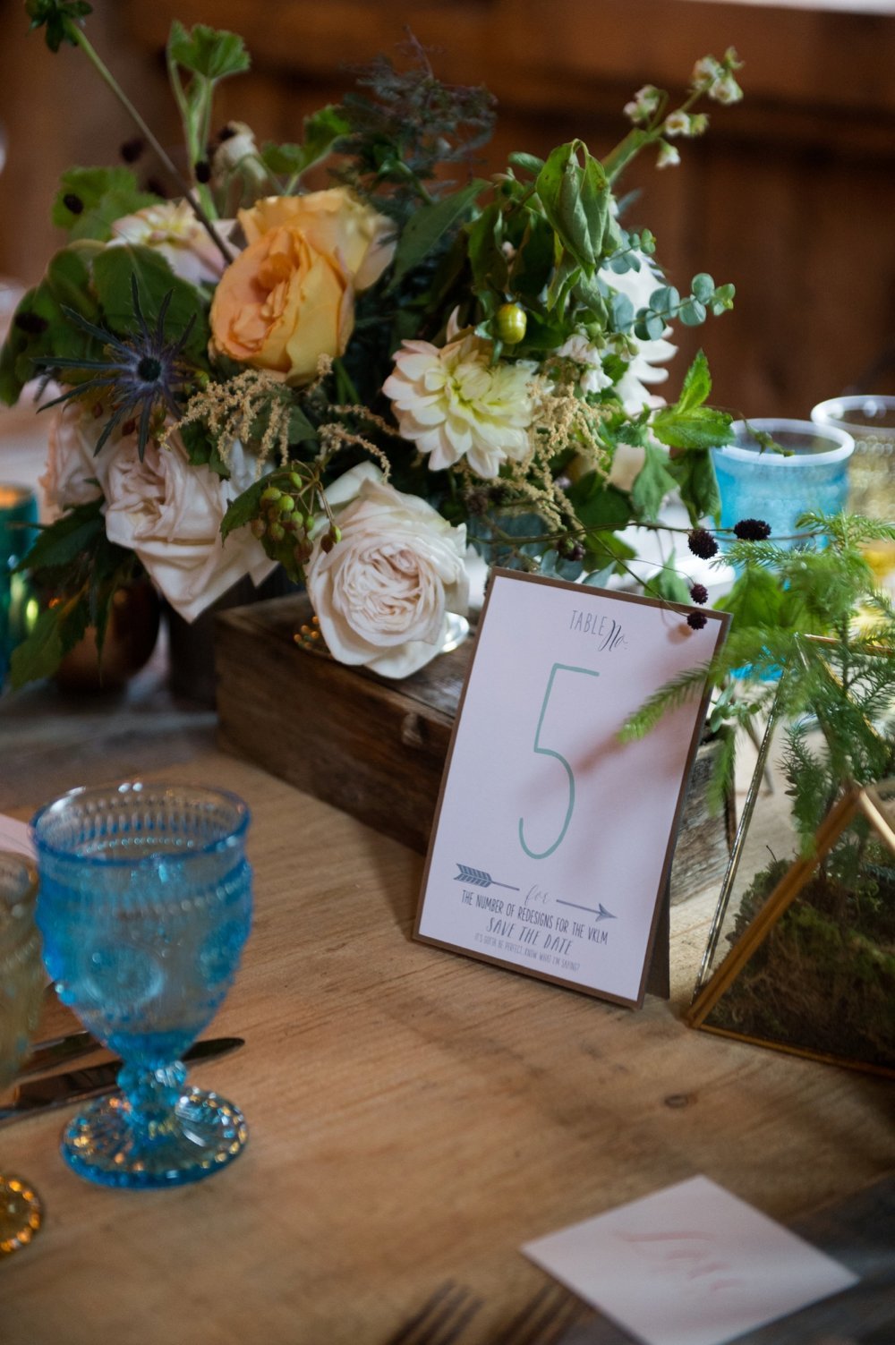 Rustic and unique table numbers for wedding at THe Barn on Walnut Hill