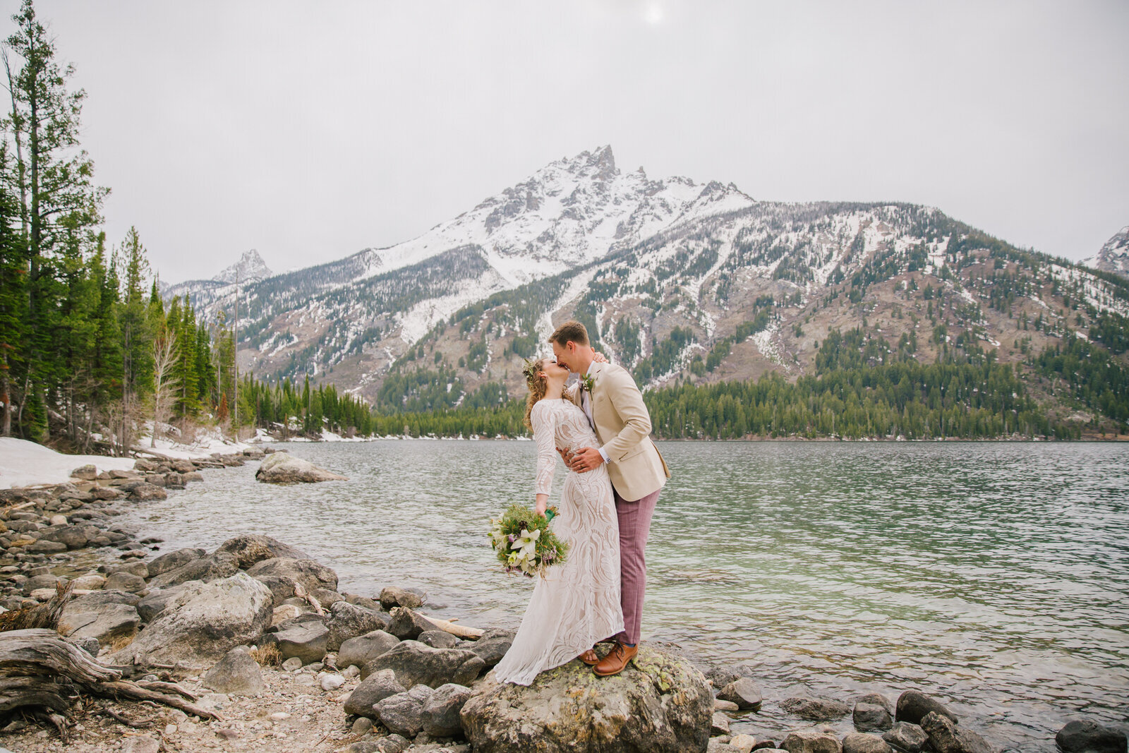 bride and groom embracing during outdoor Jackson Hole bridals