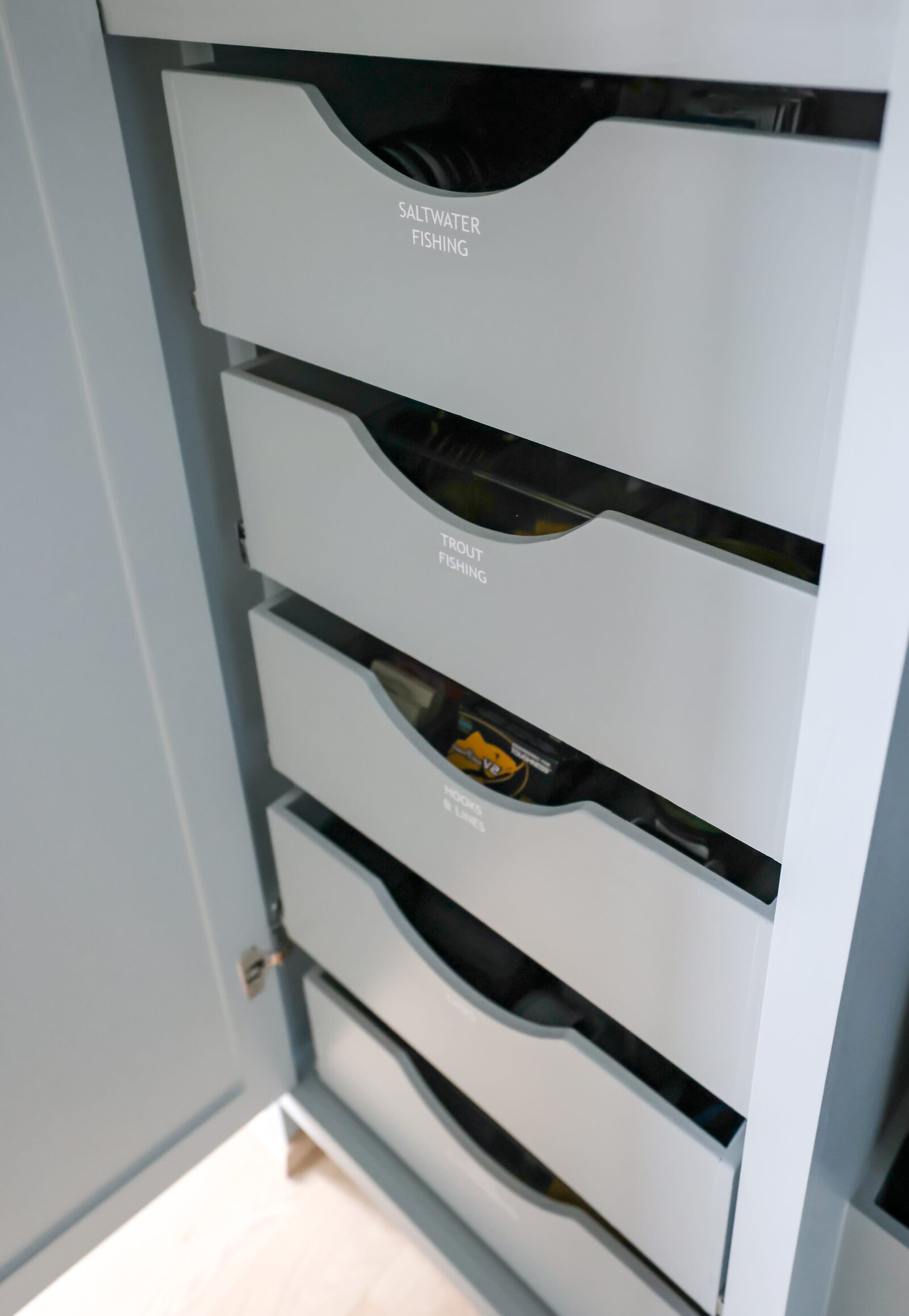 vision and hammer organizing fishing accessories drawers