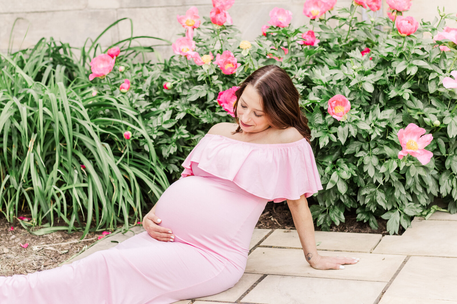 Wexford Maternity Photographer took this image of a beautiful mama to be looking at her beautiful bump during outdoor session
