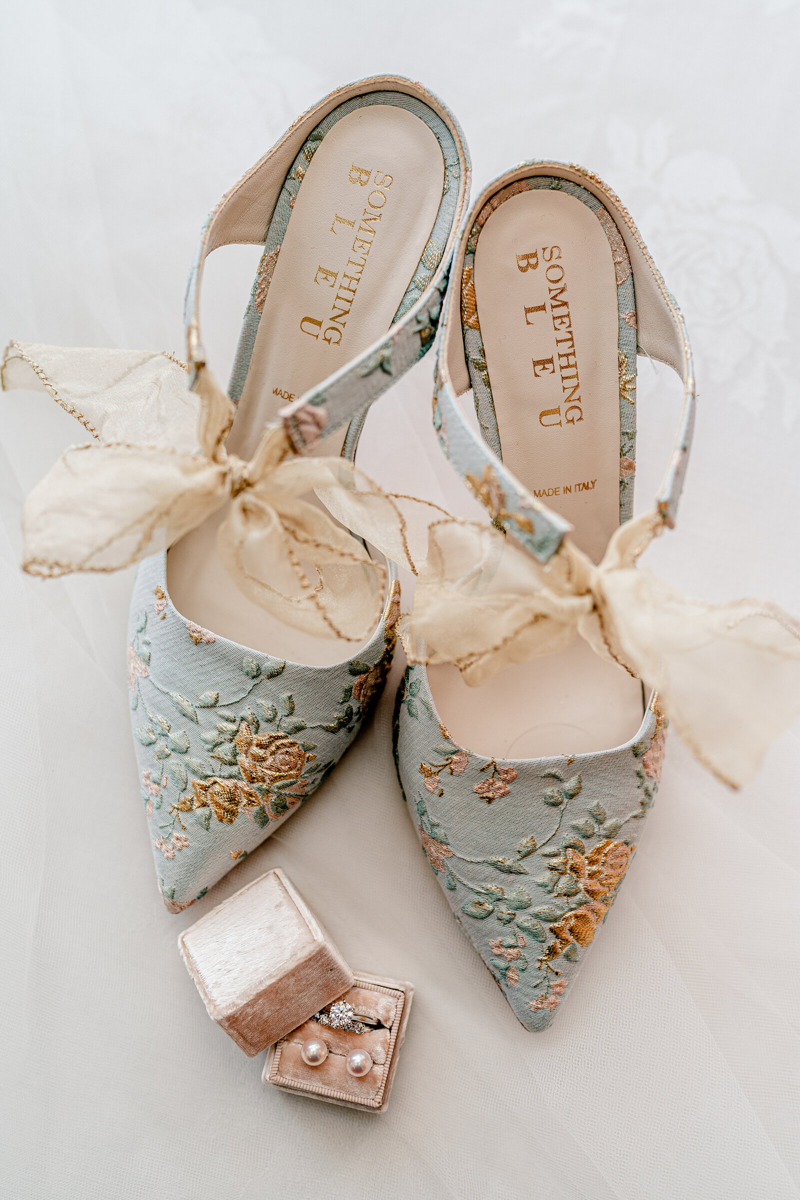 A pair of bridal shoes and jewelry for a wedding in Northern Virginia