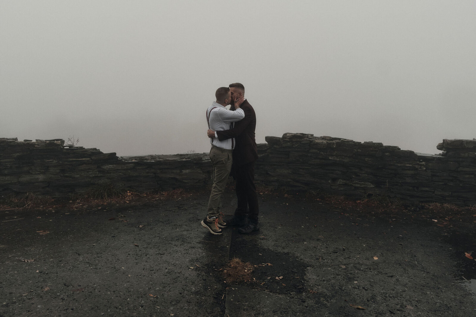 LGBTQ+ couple shares a first kiss on their elopement