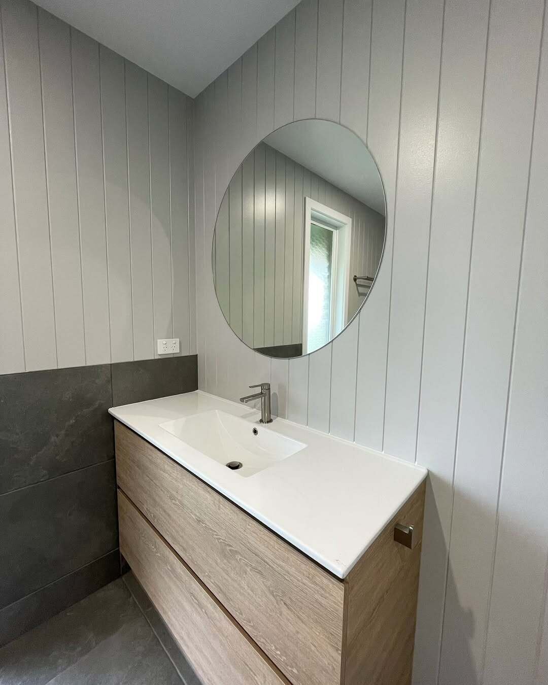 Finished bathroom storage cabinetry by AR Construction in South West VIC