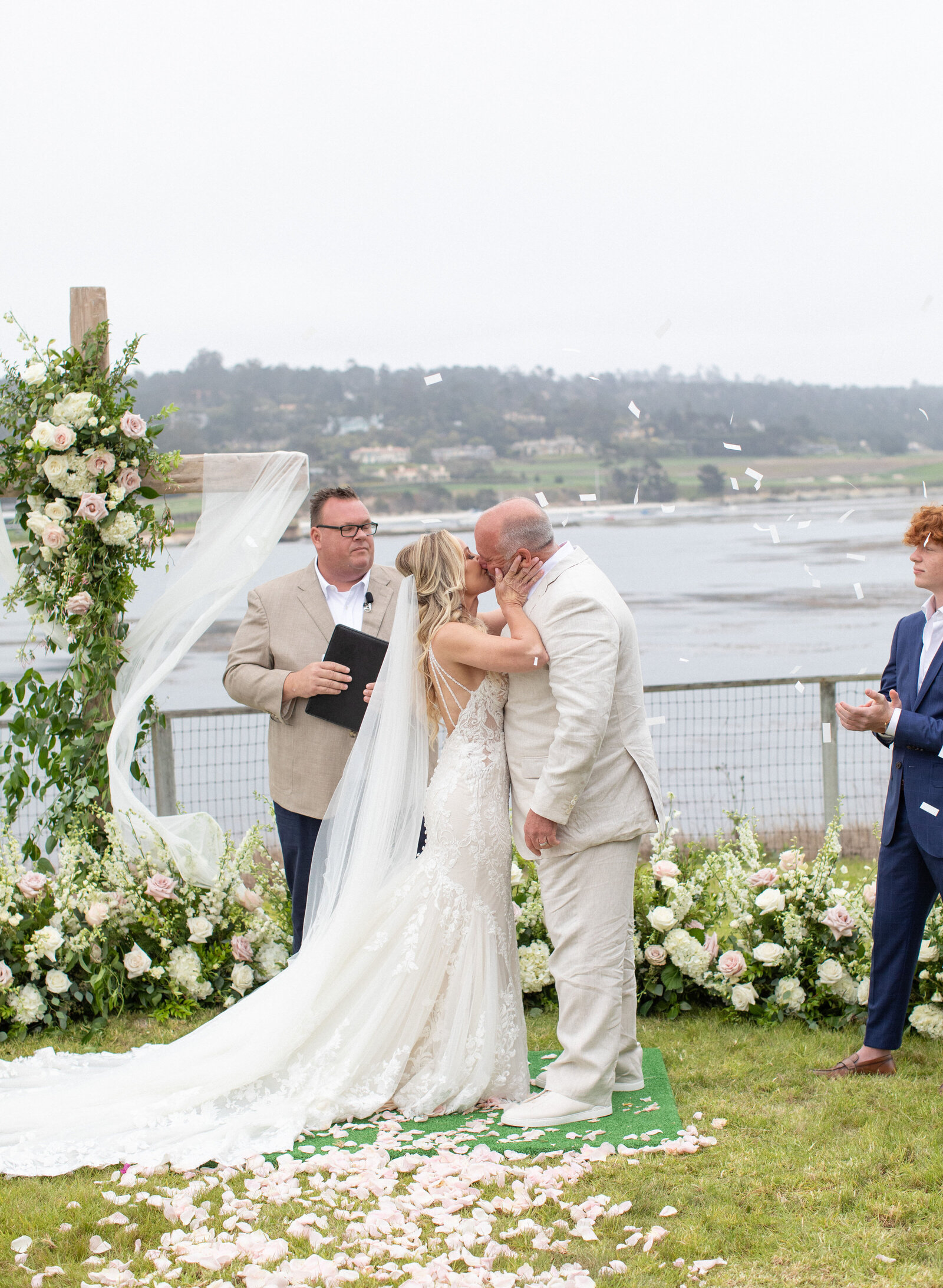 Bride and Groom Kissing at Pebble Beach