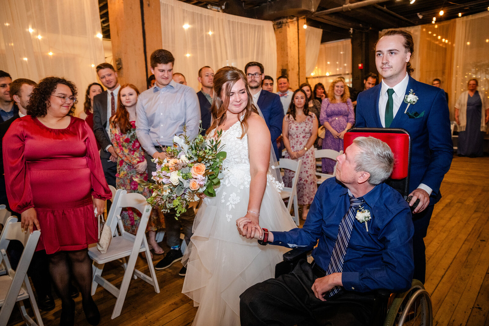 Father of bride in a wheel chair