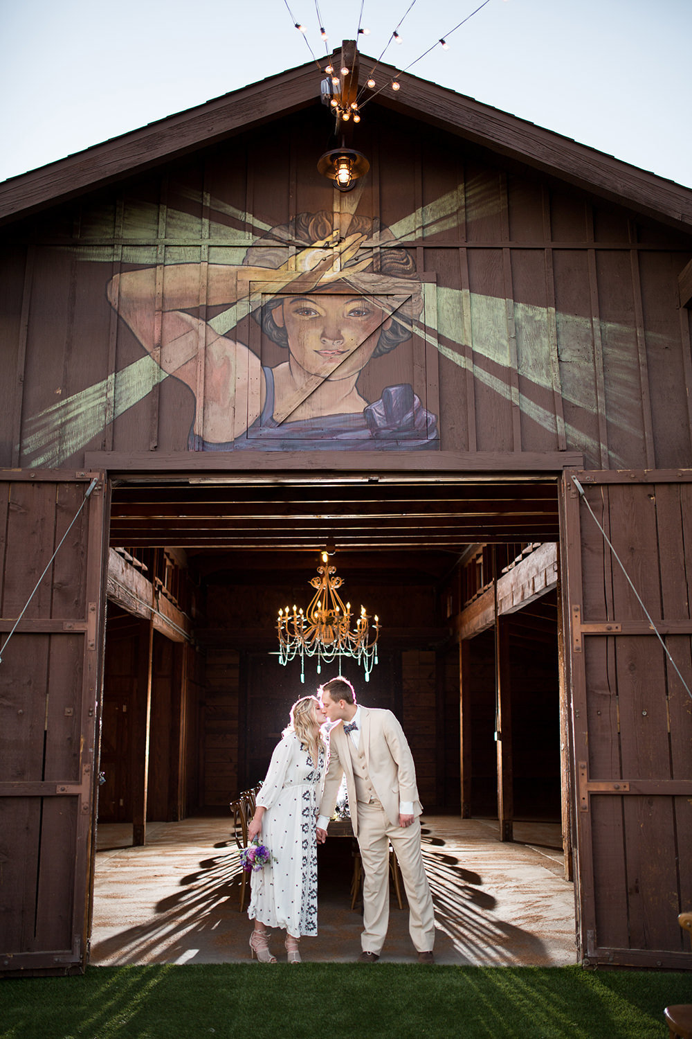 rustic barn with bride and groom
