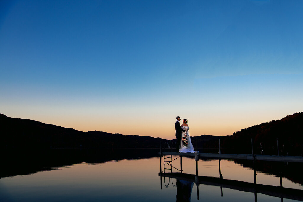 Blue hour couple's  wedding portrait at Lake Morey in Fairlee Vermont