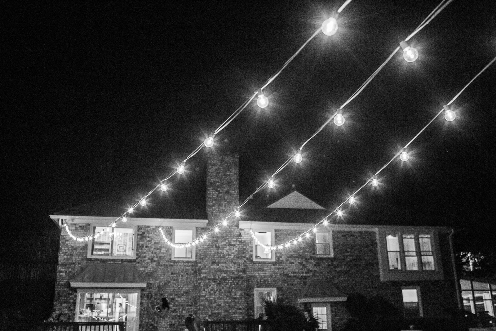 Lights shine over the reception, The Island House, Charleston, South Carolina